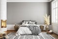 White gray bedroom interior with fireplace carpet, dry plants and decor.