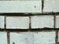 White and gray brick wall pattern, textured dirty stone material background Royalty Free Stock Photo