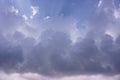White and gray cloudy sky with bright aura ray of sun beam under deep blue sky ; storm comming Royalty Free Stock Photo