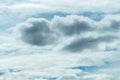 White and gray fluffy clouds on blue sky. Soft touch feeling like cotton. White puffy cloudscape. Beauty in nature. Close-up white Royalty Free Stock Photo