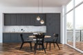 White and gray kitchen interior, balcony, table