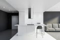 White and gray kitchen interior, bar and sofa Royalty Free Stock Photo