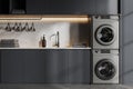 White and gray laundry room interior