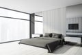 White and gray master bedroom with TV Royalty Free Stock Photo