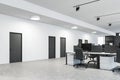 White and gray open space office with doors Royalty Free Stock Photo
