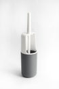 White and gray plastic toilet brush on white background Royalty Free Stock Photo