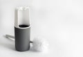 White and gray plastic toilet brush on white background Royalty Free Stock Photo
