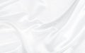 White gray satin texture that is white silver fabric silk background with beautiful soft blur pattern. Royalty Free Stock Photo