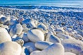 White and gray stones softly rounded and washed from sea water