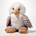 White And Gray Stuffed Animal Eagle: Capturing Suburban Ennui With Softbox Lighting