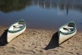 White and green canoe on banks of lagoon at Ramsgate, Kwazulu Natal. Royalty Free Stock Photo