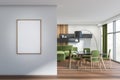 White and green dining room with frame on wall in entrance hall