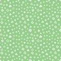 White on green hand drawn Irish shamrocks background in a stylized modern style. Vector seamless pattern