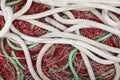White and green marine rope and tangled fishing net Royalty Free Stock Photo
