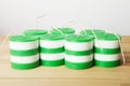 White and green striped cylindrical handmade candles Royalty Free Stock Photo