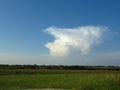 White and grey clouds in blue sky. Stormy rainy weather forecast