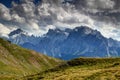 White grey clouds over Sexten Dolomites peaks and crags Italy Royalty Free Stock Photo