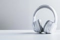 Modern White Wireless Headphones on White Surface Royalty Free Stock Photo