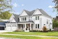 A white and grey modern farmhouse.