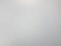 White and grey surface or wall with speckles or dots Royalty Free Stock Photo