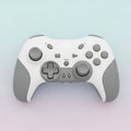 A white and grey video game controller on a pastel background Royalty Free Stock Photo