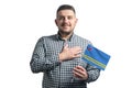 White guy holding a flag of Aruba and holds his hand on his heart isolated on a white background With love to Aruba