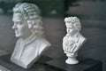 White gypsum busts of Ludwig van Beethoven and Wolfgang Amadeus Mozart, famous composers