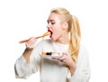 White-haired girl eating sushi