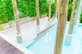 White hammocks in Luxury swimming pool . Royalty Free Stock Photo