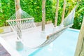 White hammocks in Luxury swimming pool . Royalty Free Stock Photo