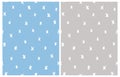 White Hand Drawn Spots Isolated on a Light Blue and Gray Background.