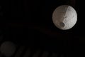 White handmade paper lamp or lampion hanging from the black ceiling Royalty Free Stock Photo