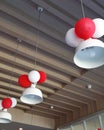 White hanging lamps decorated with red and white balloons Royalty Free Stock Photo