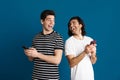 White happy two men laughing while using mobile phone Royalty Free Stock Photo