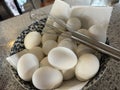 white hard boiled eggs ready to dye for EASTER.. bright colors