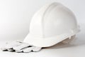 White hard hat and protection gloves Royalty Free Stock Photo