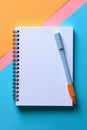 a white hardcover spiral notebook