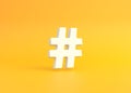 White hashtag symbol on a yellow background