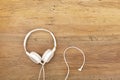 White headphones on wood Royalty Free Stock Photo