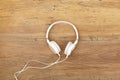 White headphones on wood Royalty Free Stock Photo