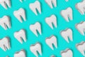 White healthy teeth motion 3D rendering pattern on blue background. National Dentist's Day Digital molar tooth anatomy Royalty Free Stock Photo