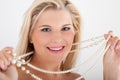 White healthy teeth and pearls Royalty Free Stock Photo