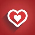 White heart in red heart in white heart on red background logo concept. Heart as a symbol of affectio love Royalty Free Stock Photo