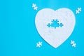 White heart shape of jigsaw puzzle pieces on blue background. concepts of problem solving, business success, teamwork, Team Royalty Free Stock Photo