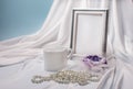 White heart-shaped circle on a white draped background. Royalty Free Stock Photo