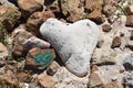 White Heart Shaped Lava Rock on a Beach Royalty Free Stock Photo