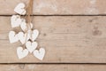 White hearts on a scaffolding wooden background