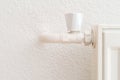 White heating radiator in an apartment. Detail shot Royalty Free Stock Photo