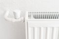 White heating radiator in an apartment. Detail shot Royalty Free Stock Photo