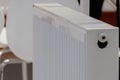 White heating radiator close-up indoors Royalty Free Stock Photo